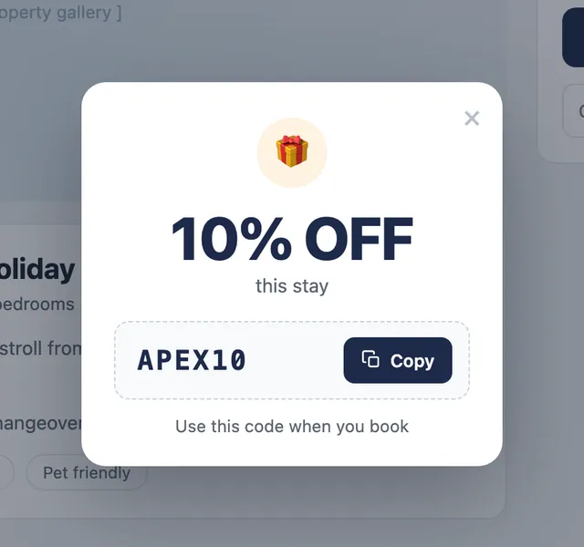 A small card: 10% off this stay, a code, a Copy button, and the words Use this code when you book.